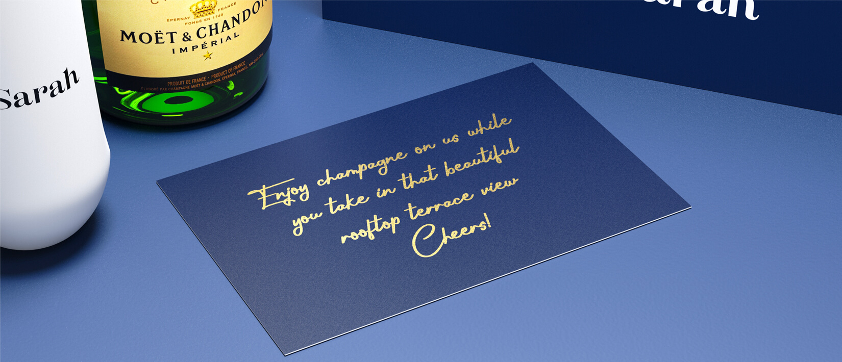 Celebratory champagne flutes and bottle in a personalized gift box. 0