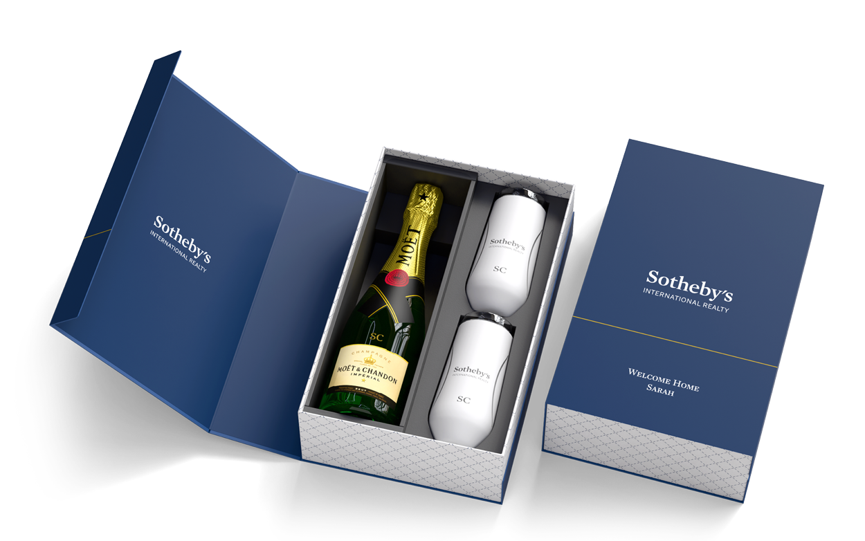 Insulated champagne flutes with a bottle of champagne and custom gift box
