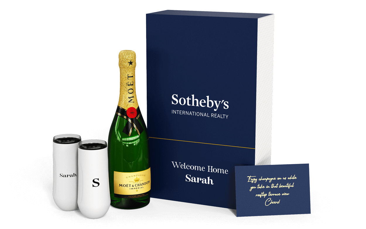 Insulated champagne flutes with a bottle of champagne and custom gift box